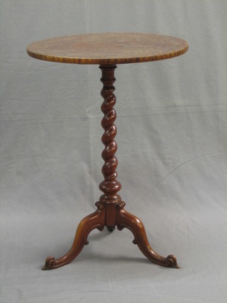 A Victorian circular wine table, raised on a spiral turned walnut column with tripod base 20"