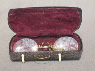 A pair of gold cased pince nez spectacles