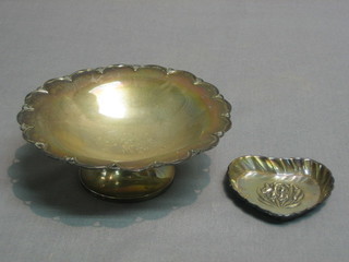 A circular silver pedestal bowl, Sheffield 1920 5" and a small silver heart shaped pin tray, embossed a flower Birmingham 1905, 3 ozs
