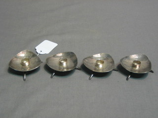 4 Danish silver plated candle holders of triangular form, raised on 3 feet, bases marked Cohr Atal