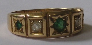 A  lady's Victorian gold dress ring set 2 diamonds and 3 emeralds