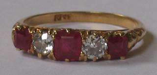 A lady's 18ct yellow gold dress ring set 3 rubies supported by 2 diamonds, approx 0.36/0.87ct