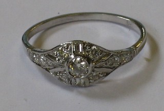 A lady's 18ct gold dress ring set numerous diamonds 