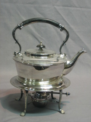 A silver plated tea kettle and stand by Walker & Hall complete with burner
