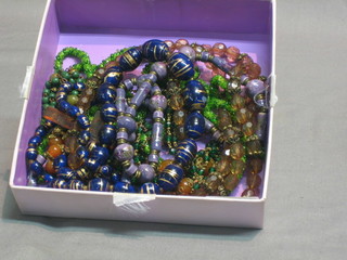 Various strings of hardstone and other beads
