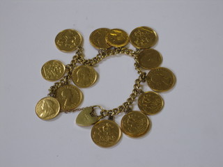 An 18ct gold curb link charm bracelet hung 7 sovereigns and 7 half sovereigns, 3 ozs