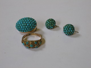 A 15ct gold ring set turquoise, a turquoise set brooch and a pair of earrings