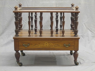 A Victorian inlaid rosewood 3 division Canterbury, the base fitted a drawer and raised on turned supports 21"
