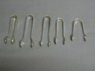 5 various pairs of small silver sugar tongs 2 ozs