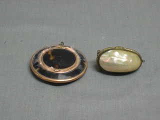 A "tortoiseshell and gold" compact 2" and a small shell box