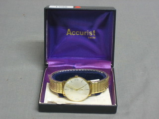 A gentleman's Avia wristwatch contained in a gold case