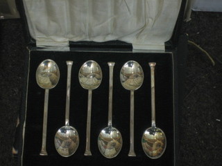 A set of 6 silver plated coffee spoons and 6 silver plated apostle spoons