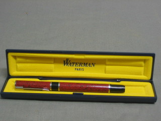 A modern Waterman cartridge fountain pen contained in a marble finished case