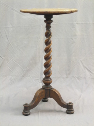 A Victorian Burr walnut wine table raised on a spiral turned column and tripod base 16"