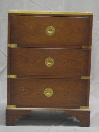 A 20th Century military style mahogany pedestal chest with brass banding and brass countersunk handles, fitted 3 long drawers raised on bracket feet 17"