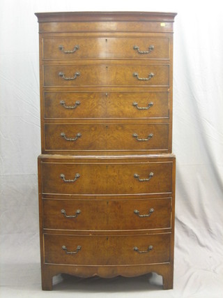 A 1940's figured walnut Georgian style chest on chest with moulded cornice above 6 long drawers, raised on bracket feet 30"