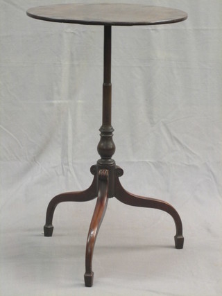 A 19th Century circular mahogany wine table, raised on pillar and tripod supports 18"