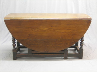 A 17th/18th Century oak oval drop flap gateleg dining table raised on turned and block supports fitted 2 drawers (constructed of old timber) 52"