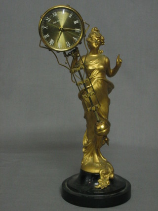 A 19th Century spelter figure of a standing lady with a later clock by President