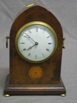 An Edwardian 8 day mantel clock with enamelled dial and Roman numerals contained in an inlaid mahogany lancet case
