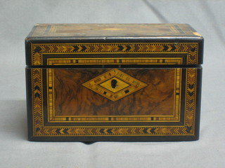 A 19th Century rectangular inlaid figured walnut twin compartment tea caddy with Tonbridge style banding 8"