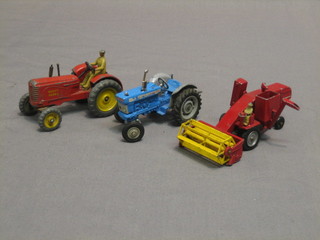 A Dinky model tractor, 1 other tractor and a Massie Ferguson combine harvester