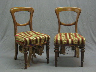 A set of 6 oak framed spoon back chairs with shaped mid rails, raised on turned supports