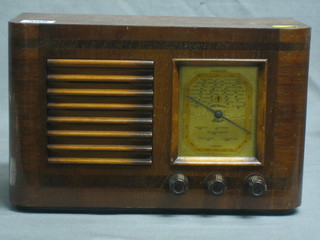 A Pilot radio contained in a wooden case