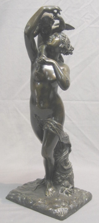 A 19th Century bronze figure of  a standing mother and child 20"