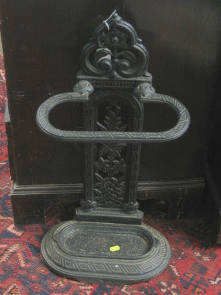 A Victorian style cast iron umbrella stand with detachable drip tray 26"