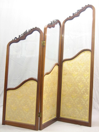 An Edwardian mahogany glazed triple fold draft screen