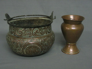 An embossed copper pot with iron swing handle 8" and a waisted copper vase 6"