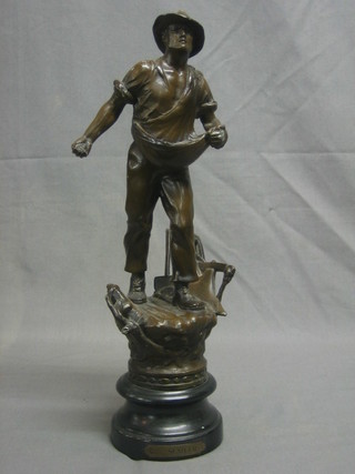 A standing spelter figure in the form of a farmer 16"