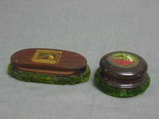 An oval HMV gramophone record cleaner and a circular ditto