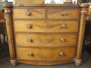 A Victorian mahogany chest of 2 short and 3 long drawers with columns to the side 51"