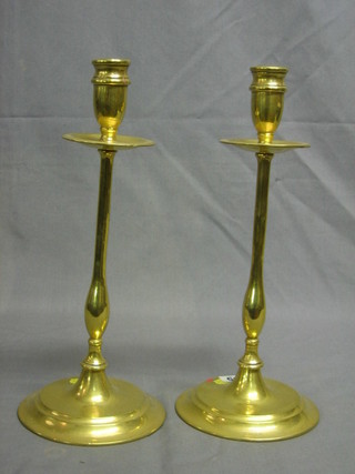 A pair of brass candlesticks 13"