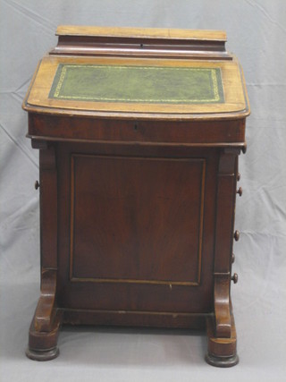 A Victorian walnut Davenport, the top with stationery box enclosed by a hinged lid, the pedestal fitted 4 long drawers 21"