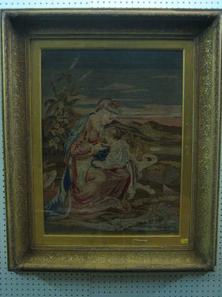 A 19th Century Berlin wool work picture "Seated Mother and Child" 24" x 17"
