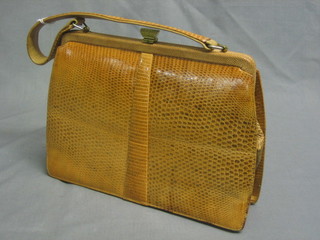 A Snakeskin handbag by Mappin & Webb