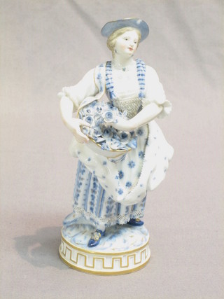 A Dresden style figure of a standing lady with basket of flowers (chip to hat) the base with blue crossed swords mark and 69 7"