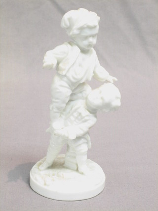A Dresden style blanc de chine porcelain figure of 2 boys, the base with blue crossed swords mark (some chips) 7"