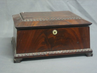 A 19th Century mahogany trinket box of sarcophagus form and bead work decoration with hinged lid, raised on scroll supports 12"