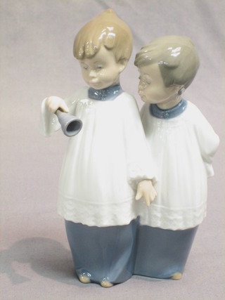 A Nao figure of 2 standing Altar boys 7"