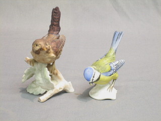 A Goebal figure of a wren 5" and a do. bluetit 4"