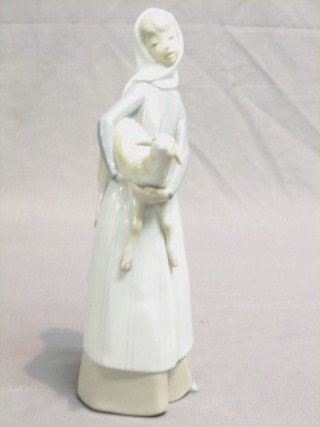 A Lladro figure of a lady with lamb 11"