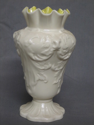 A 20th Century Beleek bell shaped vase with embossed decoration 7"