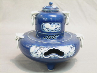 A 19th Century Oriental blue porcelain Koro with pierced decoration and twin handled 6 1/2" (some chips and damage)