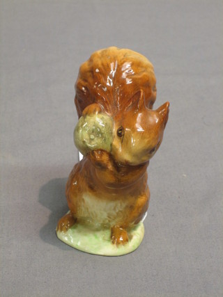 A Beswick Beatrix Potter figure  "Squirrel Nutkin", the base marked Squirrel Nutkin F Warn & Co Ltd