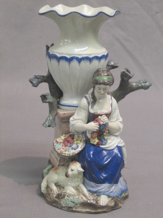 A 19th Century Staffordshire vase supported by a figure of a seated lady 9" (heavily restored)