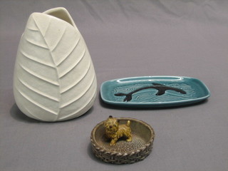 A Sylvac white glazed leaf shaped vase 6", a rectangular Poole pottery pin tray 7" and a small Wade ashtray decorated a Terrier in basket 3"